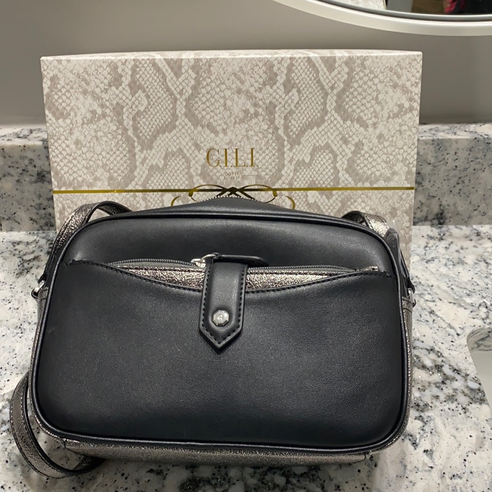Black G.I.L.I.  purse. Used once, to small for me. No longer in the original box